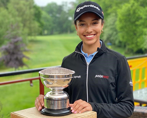 Roisin Lifts Coveted Trophy